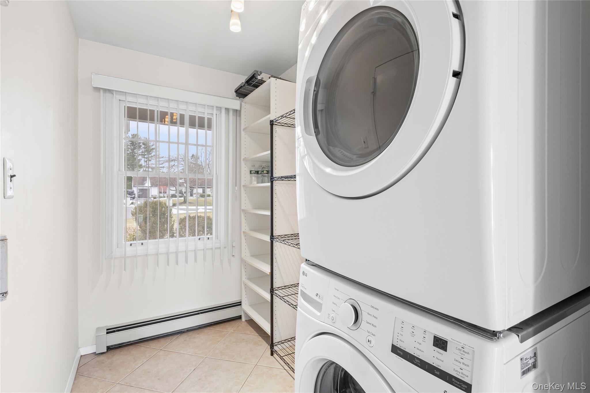 6 Hillview Court Commack, NY 11725 - Photo 26 of 43 a utility room with dryer and washer