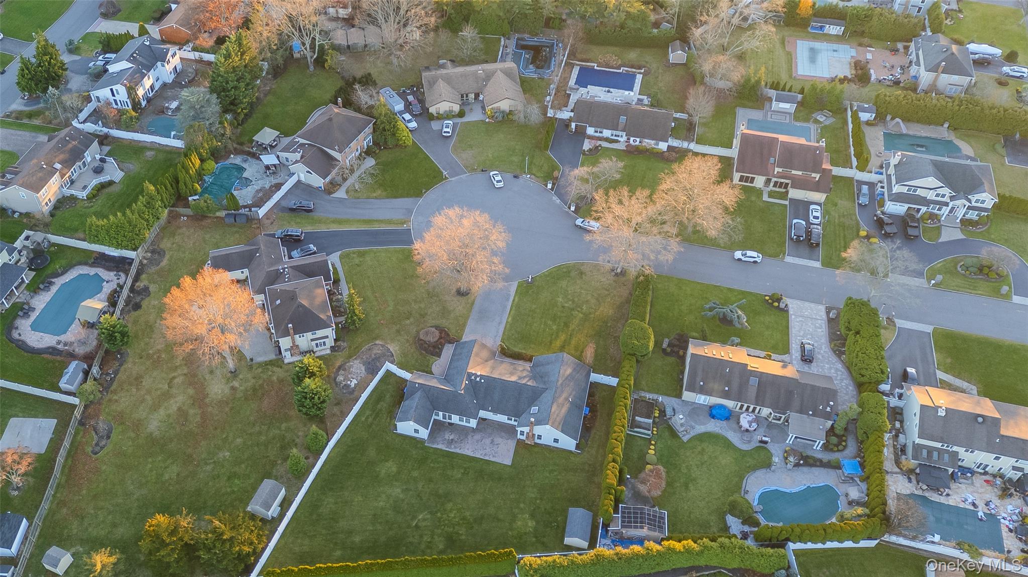 6 Hillview Court Commack, NY 11725 - Photo 36 of 43 an aerial view of residential houses with outdoor space