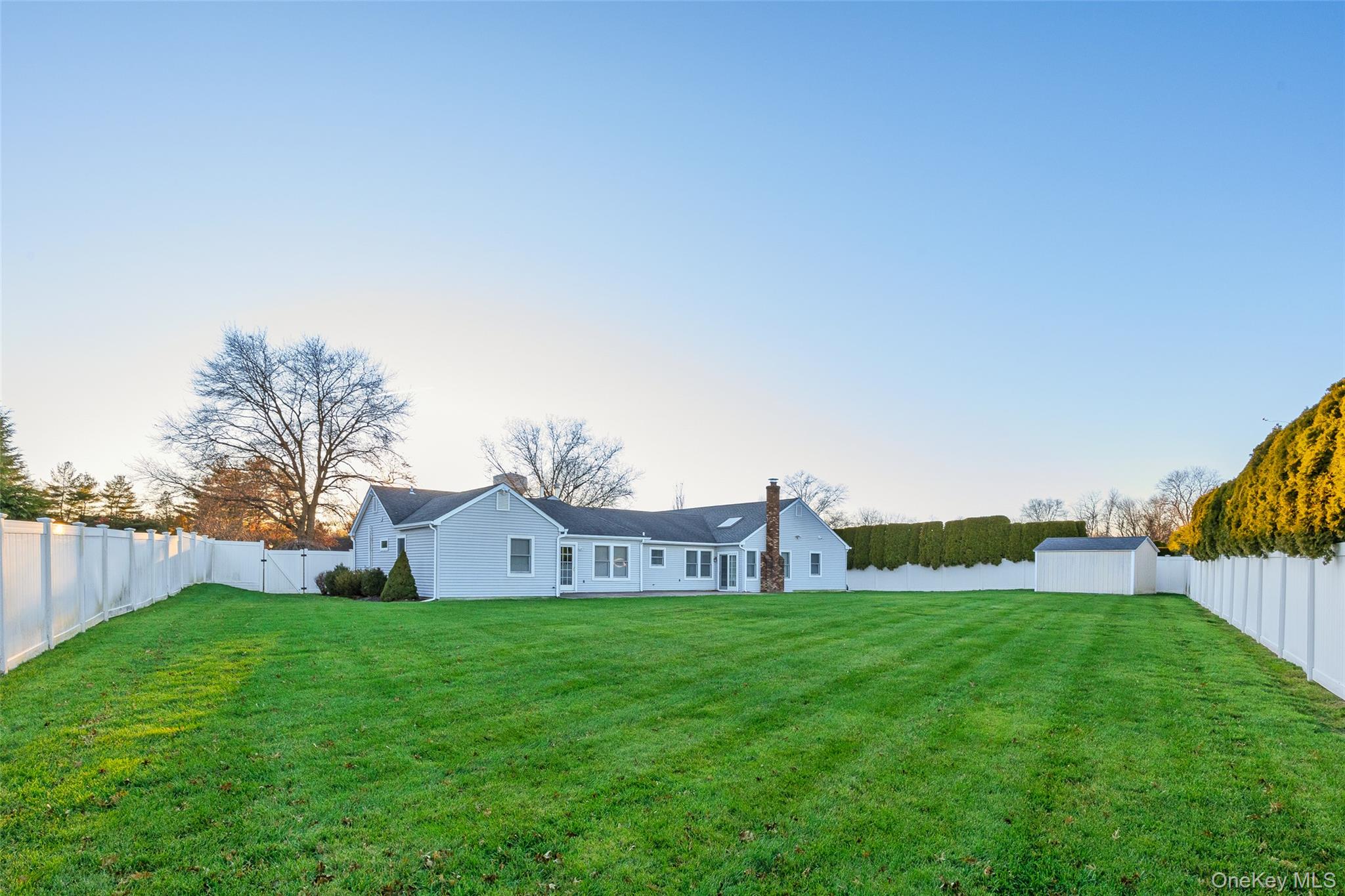 6 Hillview Court Commack, NY 11725 - Photo 40 of 43 a view of house with backyard