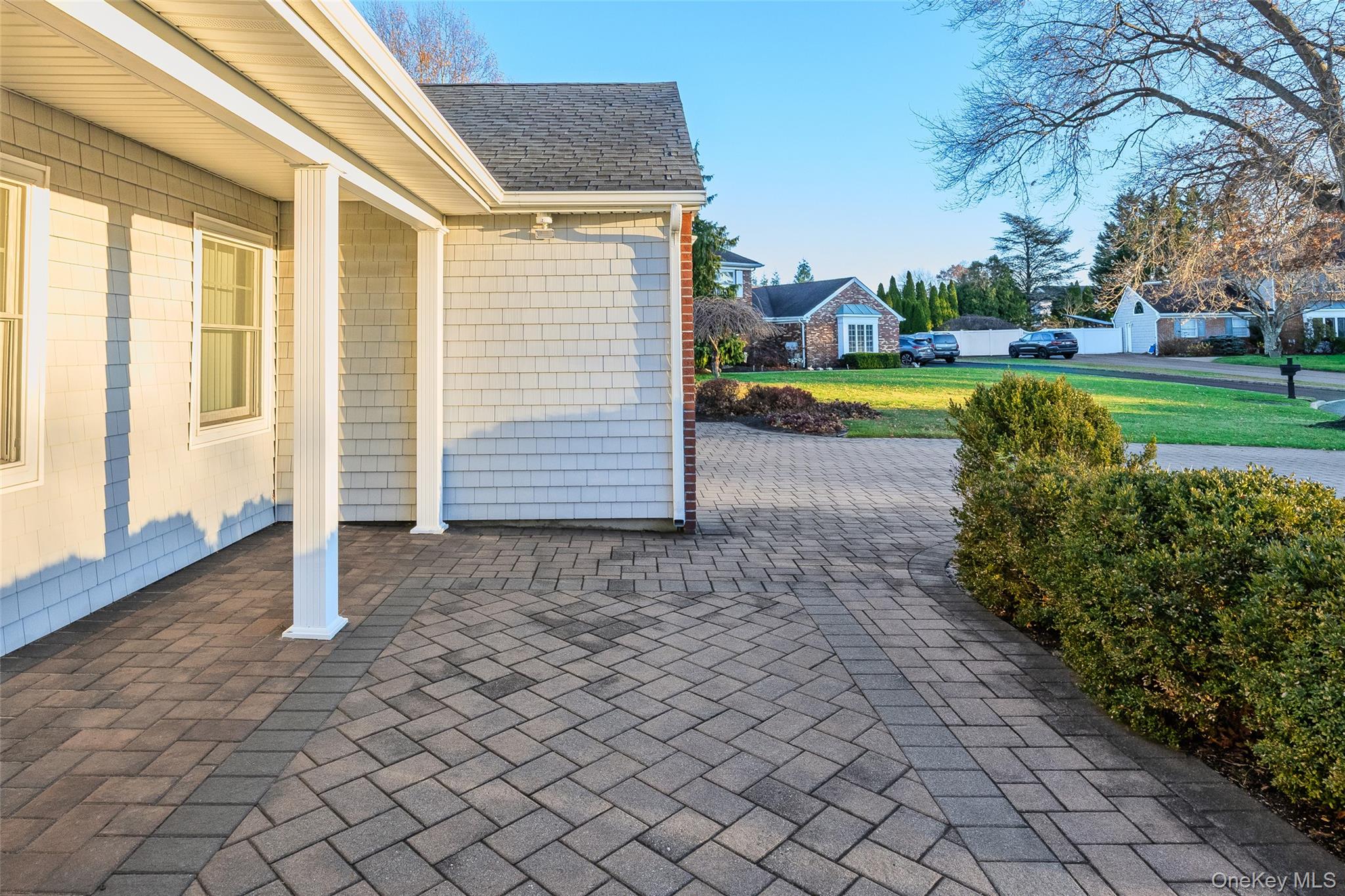 6 Hillview Court Commack, NY 11725 - Photo 6 of 43 a view of swimming pool with sitting area and garden