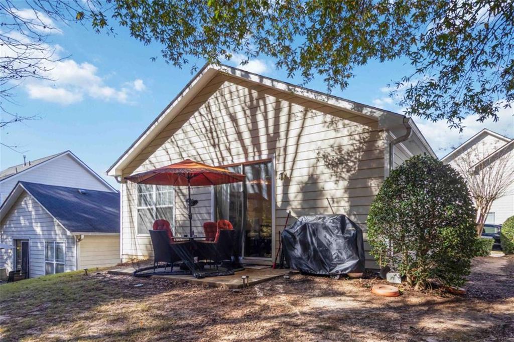 782 Jasperson Court Fairburn, GA 30213 - Photo 23 of 30 a view of a two chairs in a patio