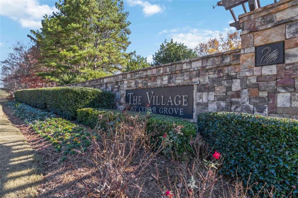 782 Jasperson Court Fairburn, GA 30213 - Photo 27 of 30 a view of a sign in a garden