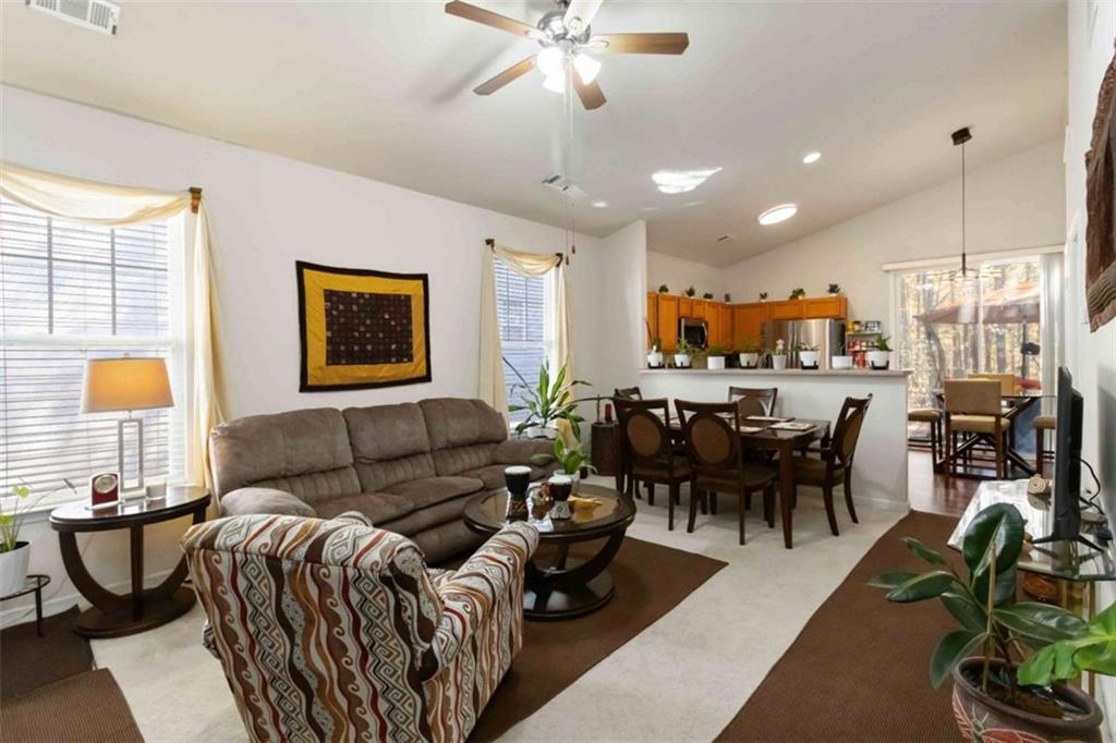 782 Jasperson Court Fairburn, GA 30213 - Photo 4 of 30 a living room with furniture kitchen view and a window