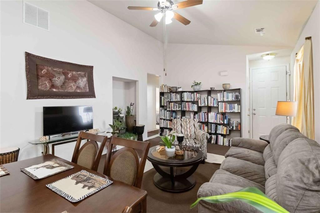 782 Jasperson Court Fairburn, GA 30213 - Photo 5 of 30 a living room with furniture and a flat screen tv