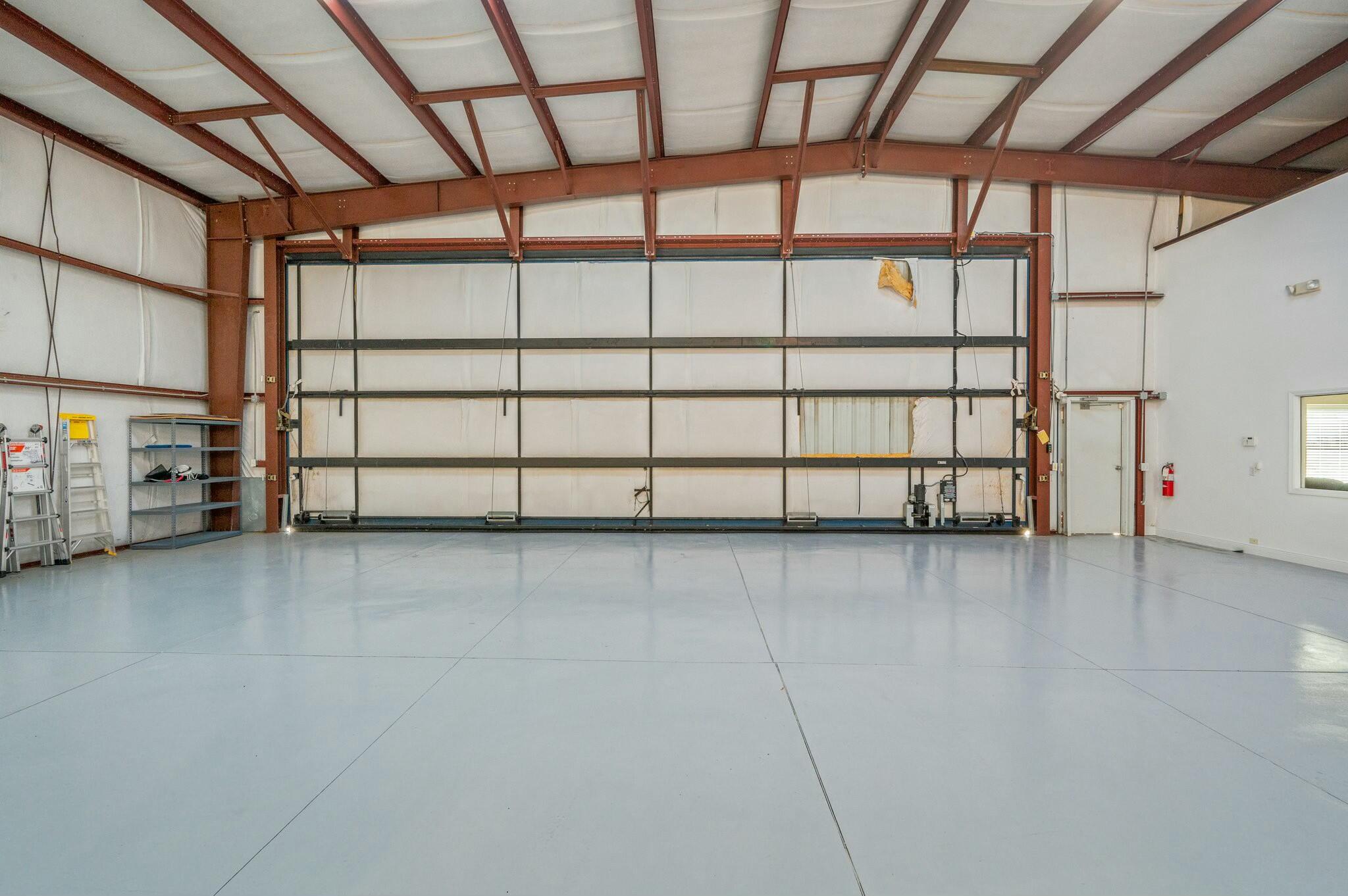 1476 Vinson Ray Road Baker, FL 32531 - Photo 11 of 41 a view of a garage