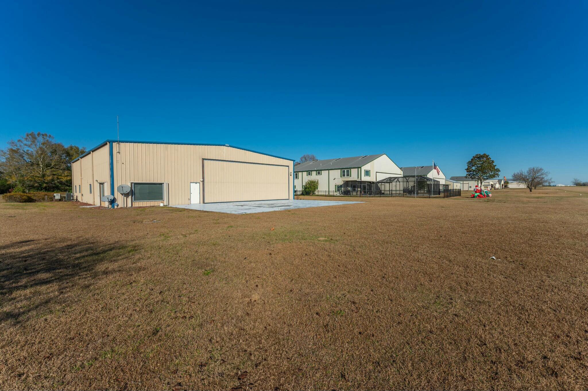 1476 Vinson Ray Road Baker, FL 32531 - Photo 4 of 41 a view of a house with a road