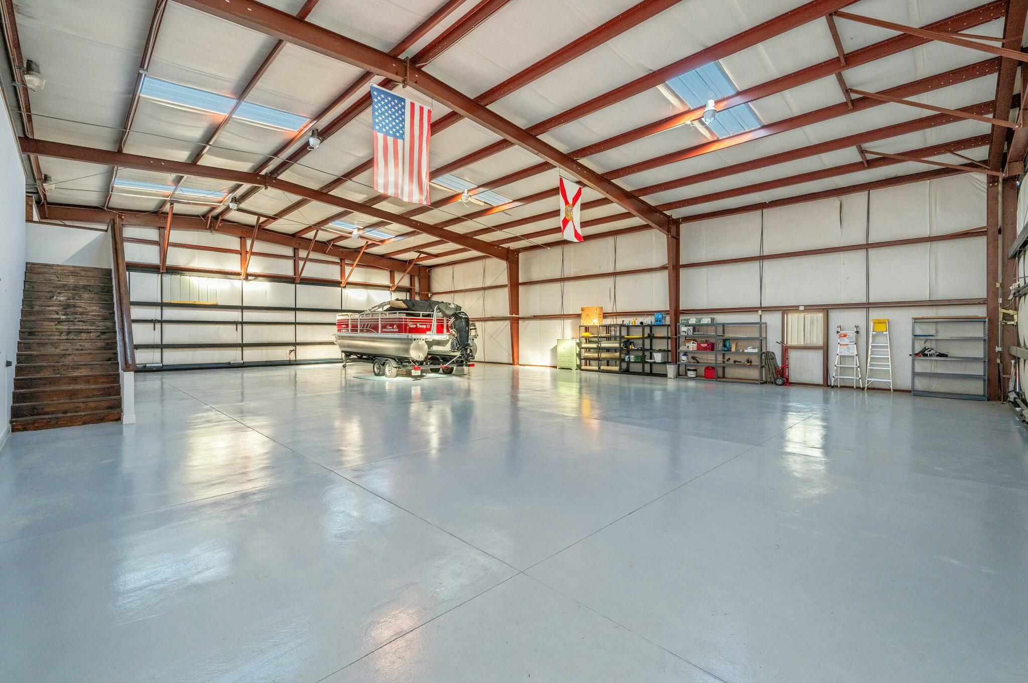 1476 Vinson Ray Road Baker, FL 32531 - Photo 10 of 41 a view of a studio with wooden floor