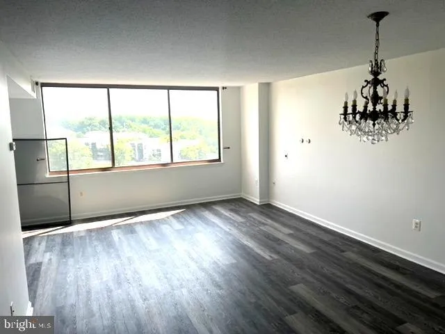 a view of a storage & utility room with wooden floor