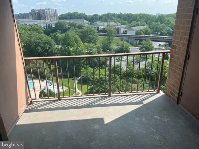 a view of balcony with floor to ceiling window and stairs