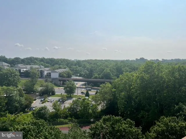 a view of a living room and entry way