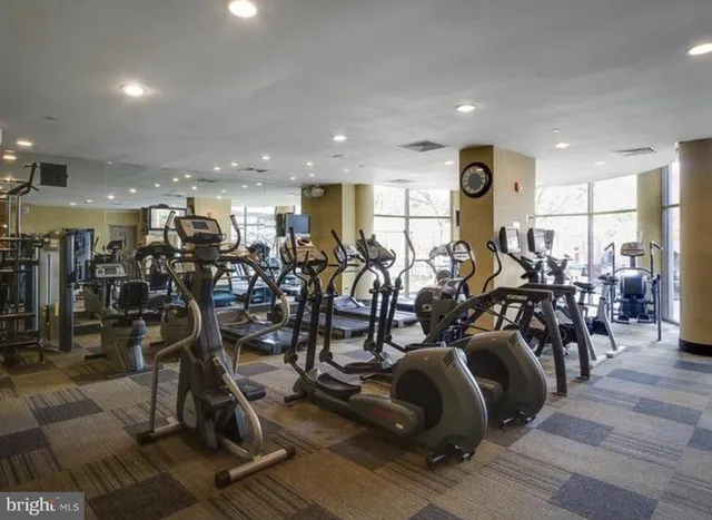 a view of a swimming pool and lounge chairs