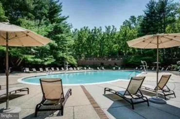 a outdoor view of a building with traffic signal lights
