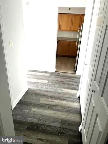 a view of staircase with white walls