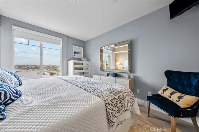 a bedroom with a bed and a window in it