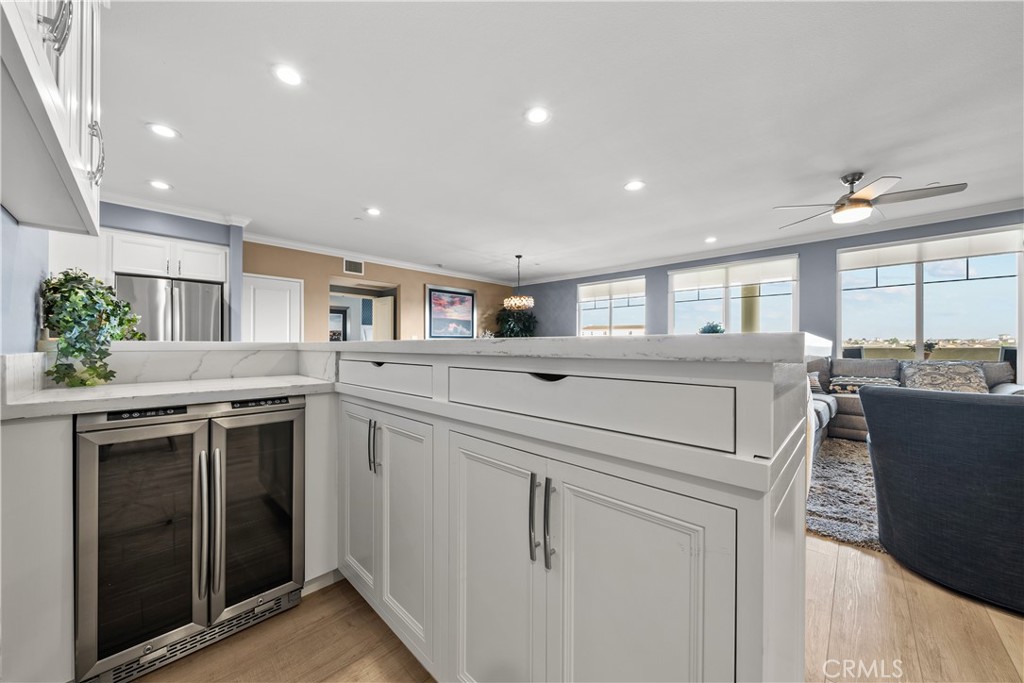 4344 Tradewinds Drive Oxnard, CA 93035 - Photo 5 of 57 a kitchen that has a lot of cabinets in it and appliances