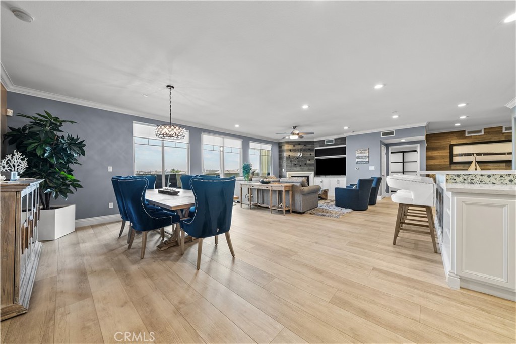4344 Tradewinds Drive Oxnard, CA 93035 - Photo 10 of 57 a view of a dining room with furniture window and wooden floor