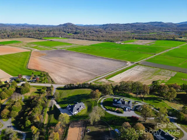 an aerial view of a house with a garden