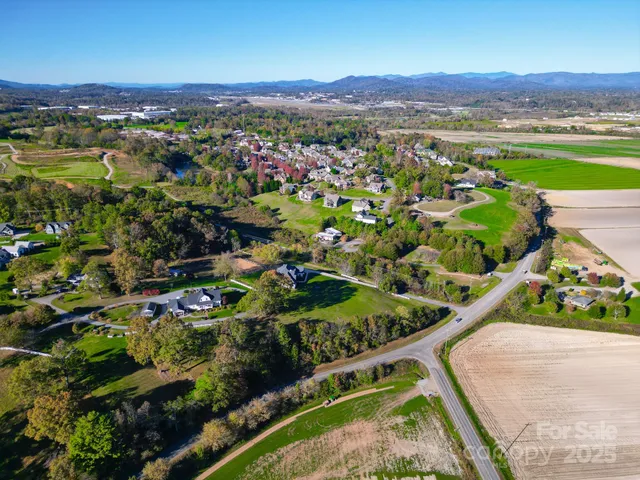 a view of a city with mountains in the background