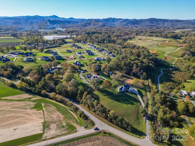 a view of a city with a lake