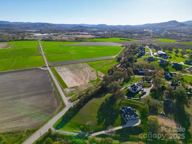 an aerial view of a golf course with a garden