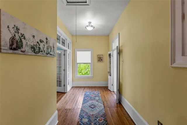 a view of a hallway with entryway