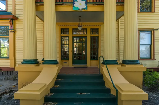 a swimming pool with outdoor seating
