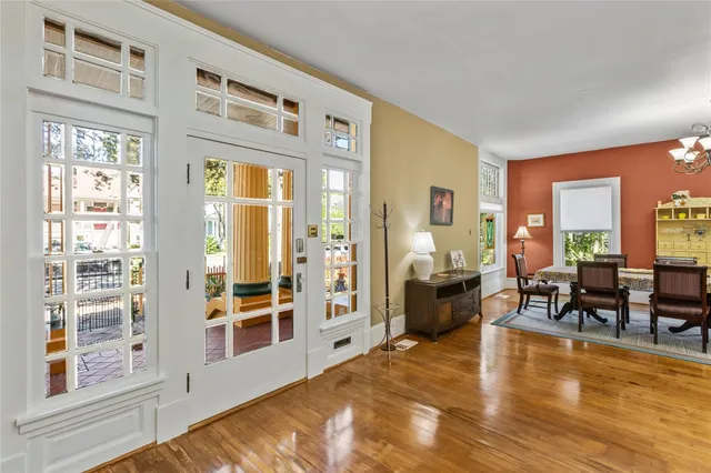 a view of a living room filled with furniture