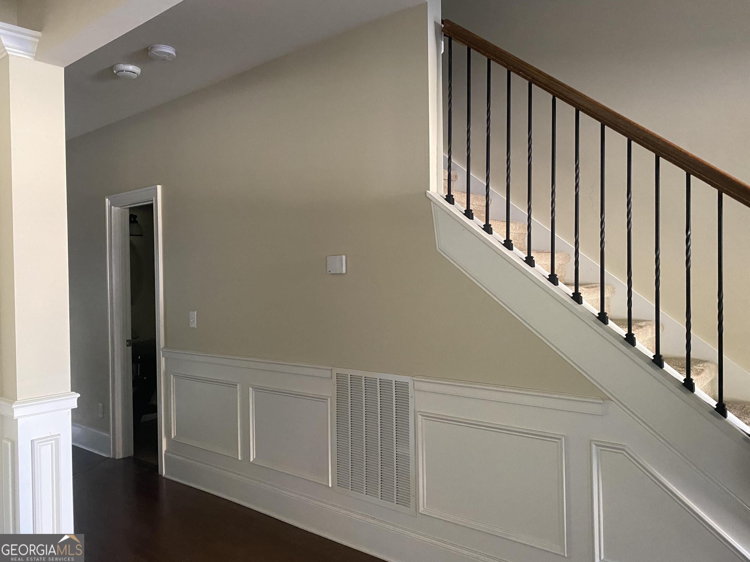 5441 Stirrup Way Powder Springs, GA 30127 - Photo 5 of 17 a view of staircase with white walls and a window