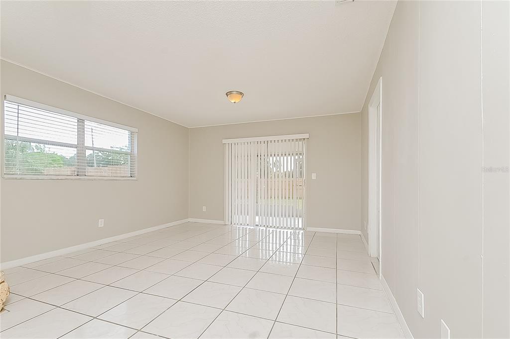 2902 Ripplewood Drive Seffner, FL 33584 - Photo 7 of 18 a view of an empty room with a window