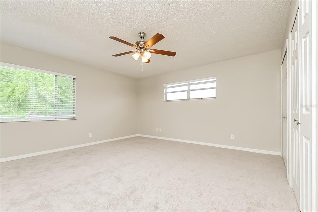 2902 Ripplewood Drive Seffner, FL 33584 - Photo 8 of 18 a view of an empty room with a window