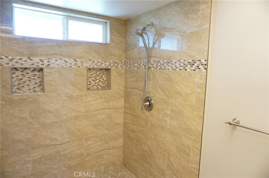 19584 Shadow Glen Circle Porter Ranch, CA 91326 - Photo 26 of 72 a bathroom with a shower