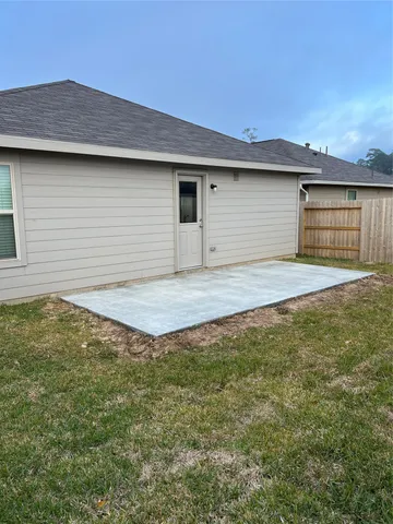 a view of a backyard of a house