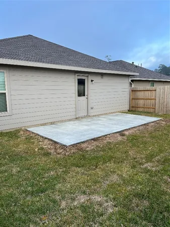 a view of a backyard of a house