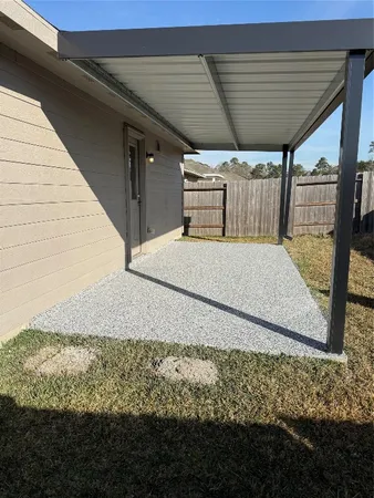 a view of a backyard of the house
