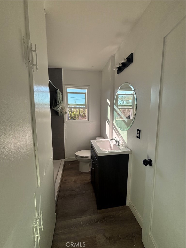 15360 Washington Street Riverside, CA 92506 - Photo 8 of 14 a view of bathroom with a sink and mirror