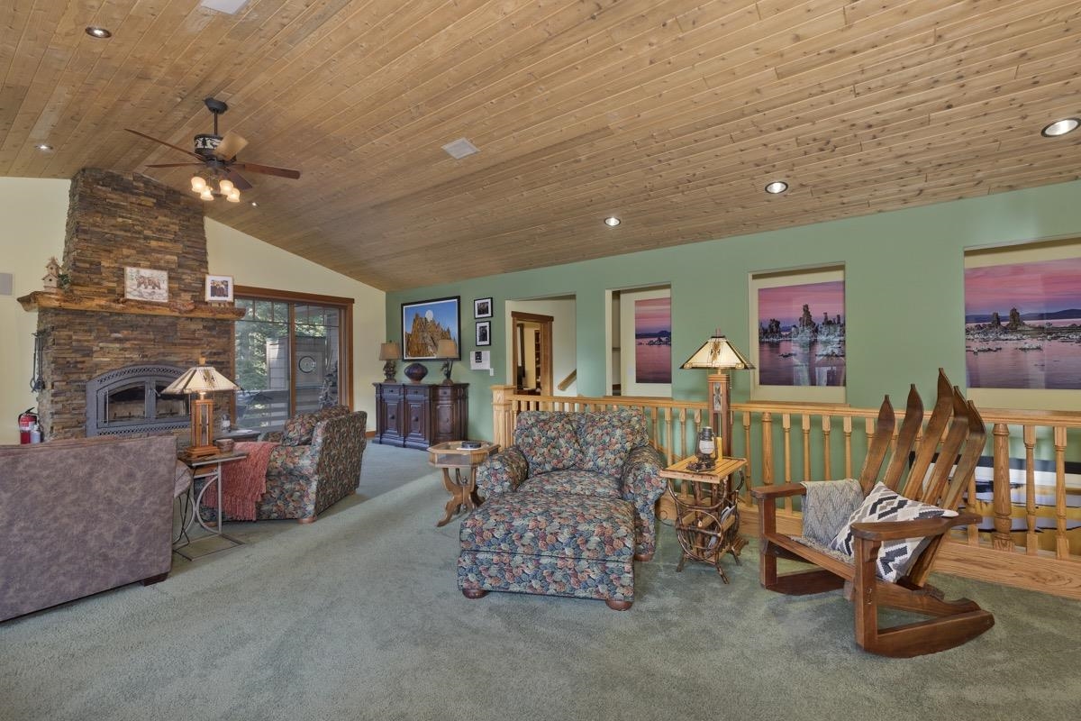 2500 Old Mammoth Road Mammoth Lakes, CA 93546 - Photo 9 of 48 a living room with furniture and a chandelier