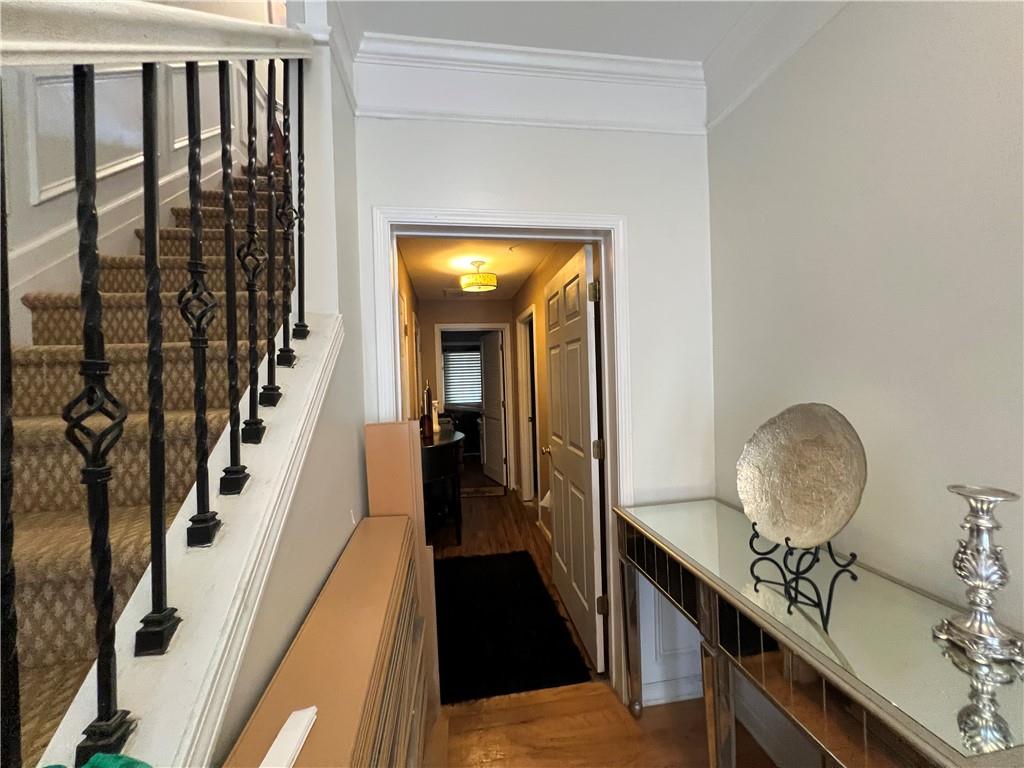 3914 Howell Park Road Duluth, GA 30096 - Photo 22 of 33 a view of a hallway with wooden floor and staircase