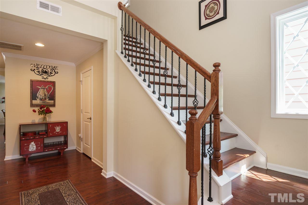5622 Wade Park Boulevard Raleigh, NC 27607 - Photo 3 of 25 LOVELY FOYER WITH NATURAL STOPPING POINT TO GIVE PRIVACY TO THE LIVING AREA OF THIS WELL APPOINTED HOME!