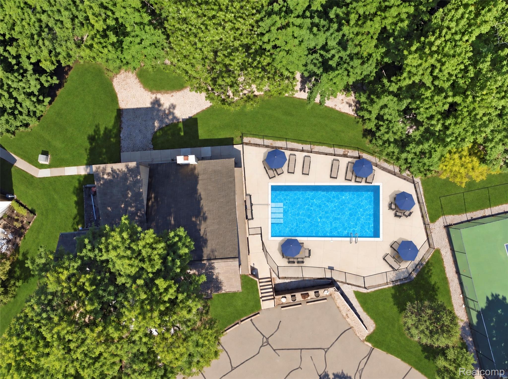 1830 Streamedge Court Rochester, MI 48309 - Photo 30 of 33 Outdoor swimming pool with surrounding patio