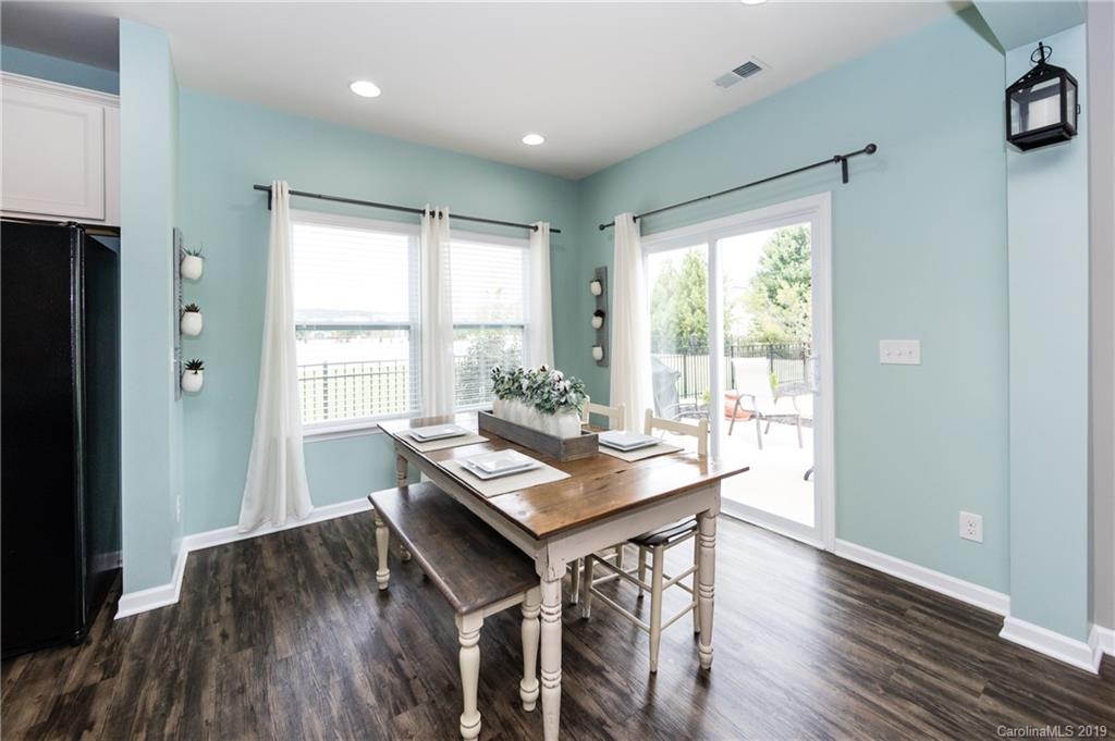 79481 Ridgehaven Road Lancaster, SC 29720 - Photo 11 of 41 a view of a dining room with furniture window and wooden floor