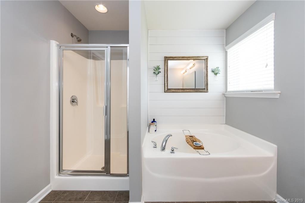 79481 Ridgehaven Road Lancaster, SC 29720 - Photo 23 of 41 a bathroom with a bathtub and a window