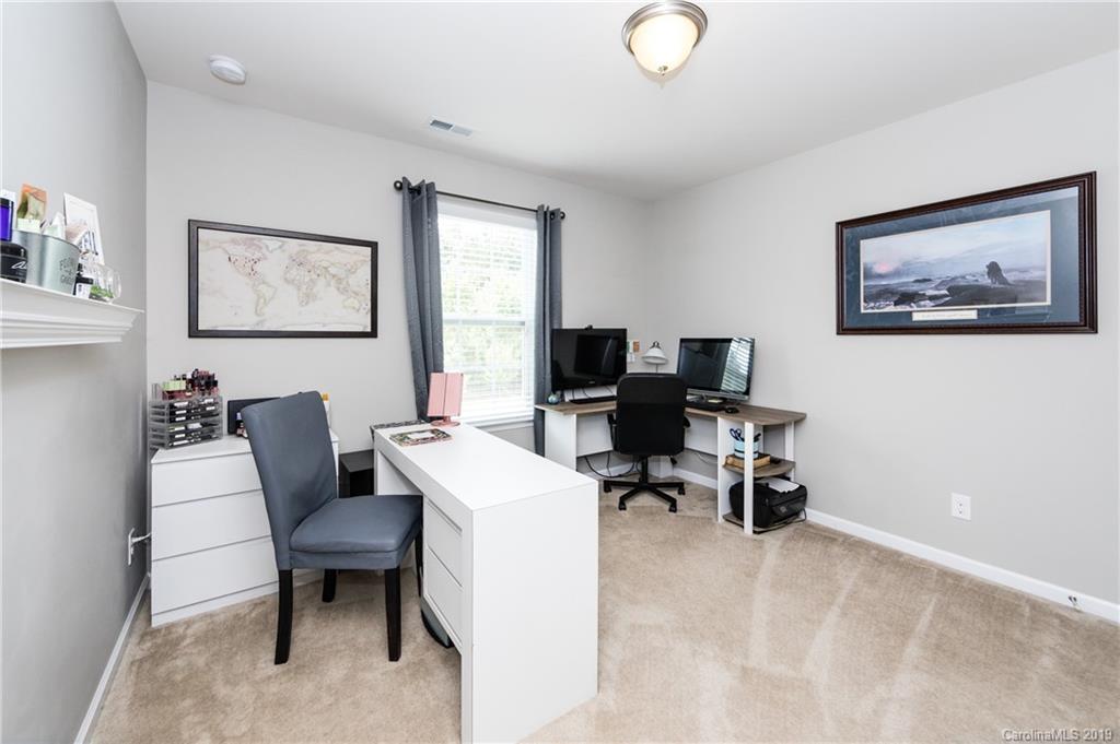 79481 Ridgehaven Road Lancaster, SC 29720 - Photo 30 of 41 a view of a workspace with furniture and a window