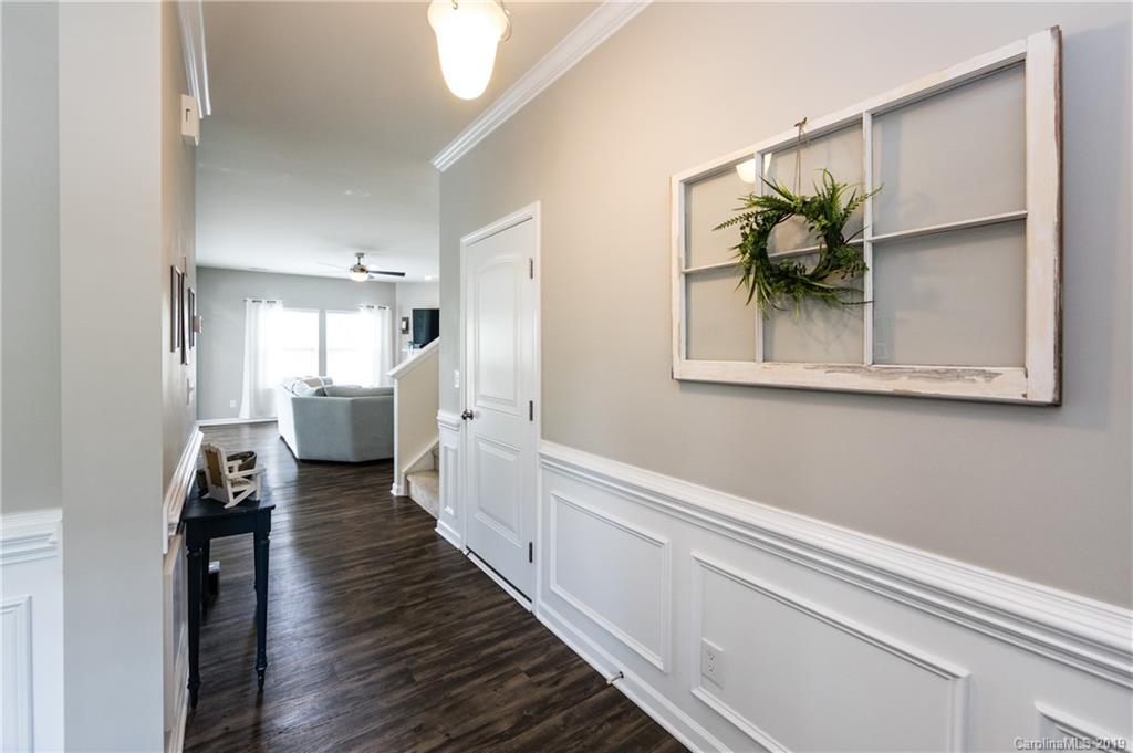 79481 Ridgehaven Road Lancaster, SC 29720 - Photo 4 of 41 a view of a hallway with wooden floor and staircase