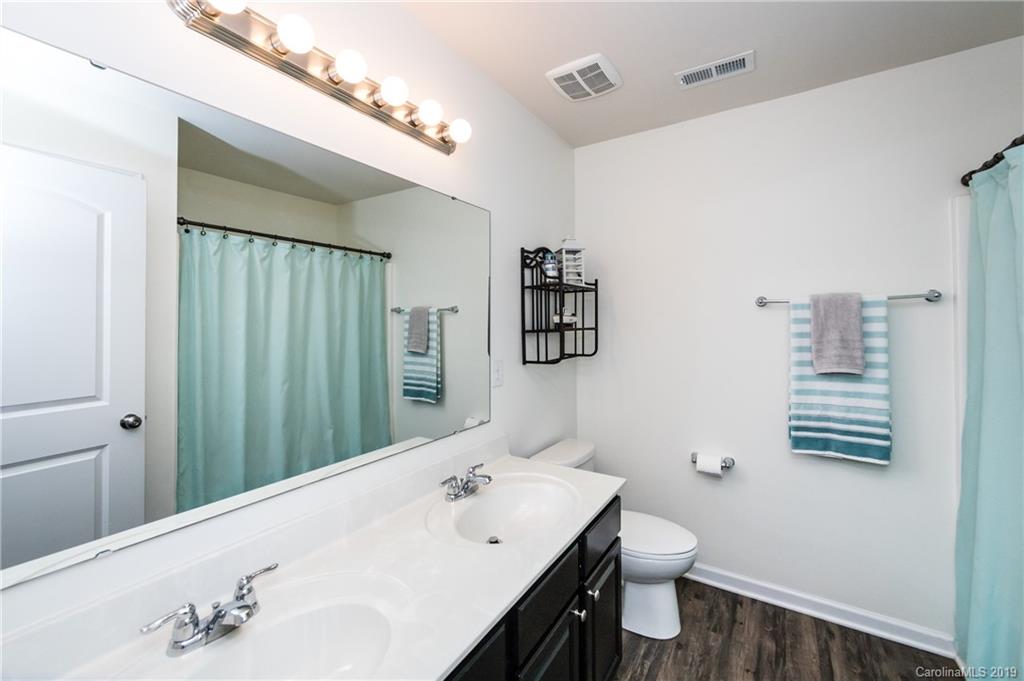 79481 Ridgehaven Road Lancaster, SC 29720 - Photo 31 of 41 a bathroom with a sink a toilet and shower