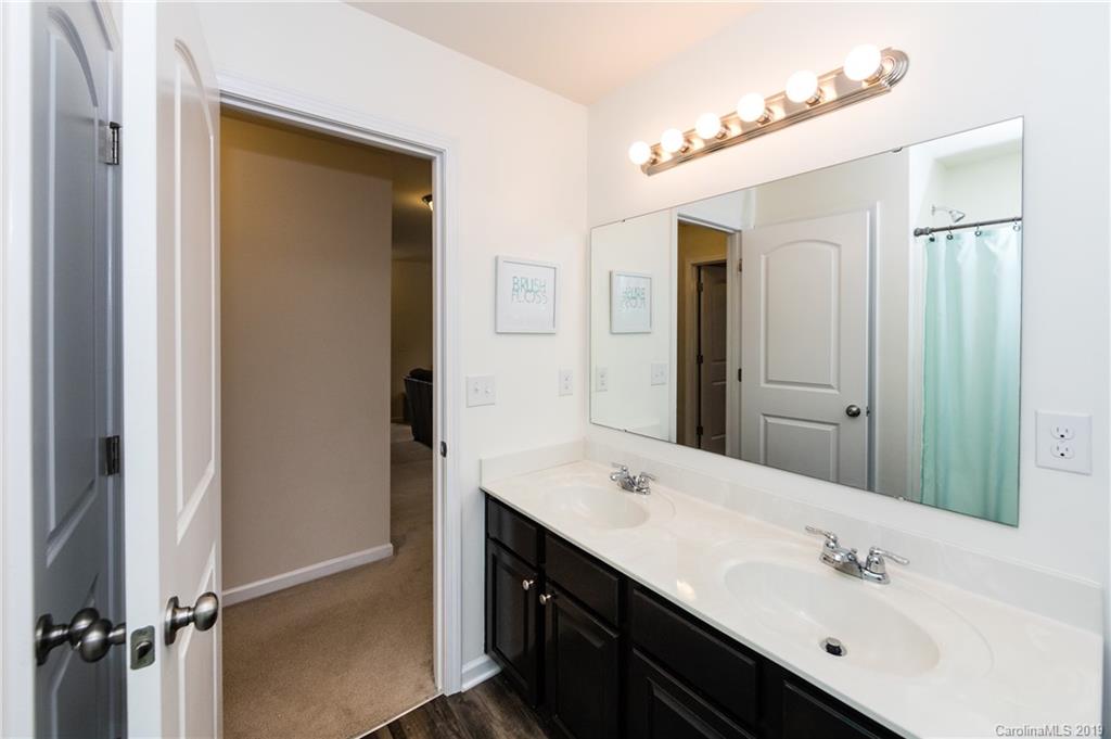 79481 Ridgehaven Road Lancaster, SC 29720 - Photo 32 of 41 a bathroom with a double vanity sink mirror and shower