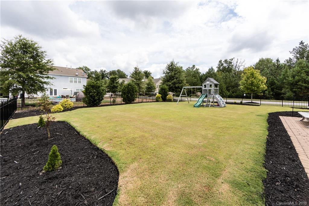 79481 Ridgehaven Road Lancaster, SC 29720 - Photo 36 of 41 a view of a swimming pool with a yard and large trees
