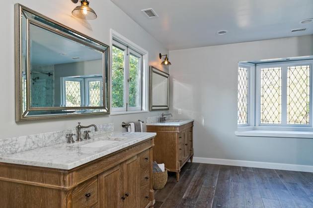 604 Gridley Road Ojai, CA 93023 - Photo 28 of 50 a bathroom with a sink double vanity granite and a mirror