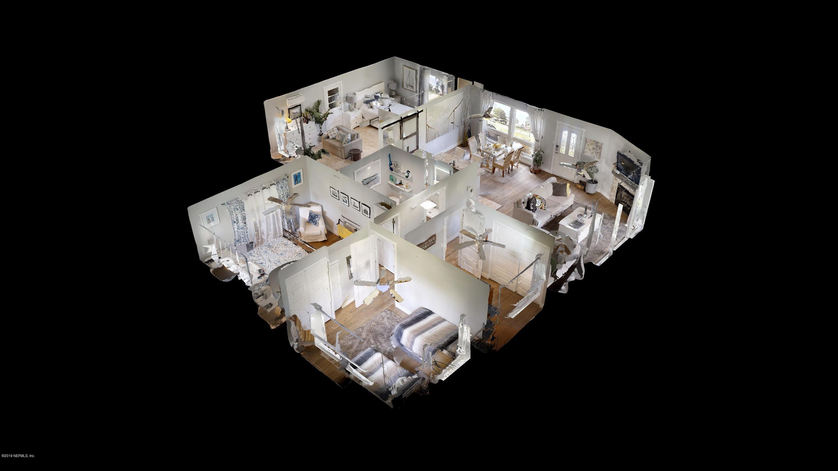 32 Dolphin Drive St. Augustine, FL 32080 - Photo 31 of 43 a close up of a table