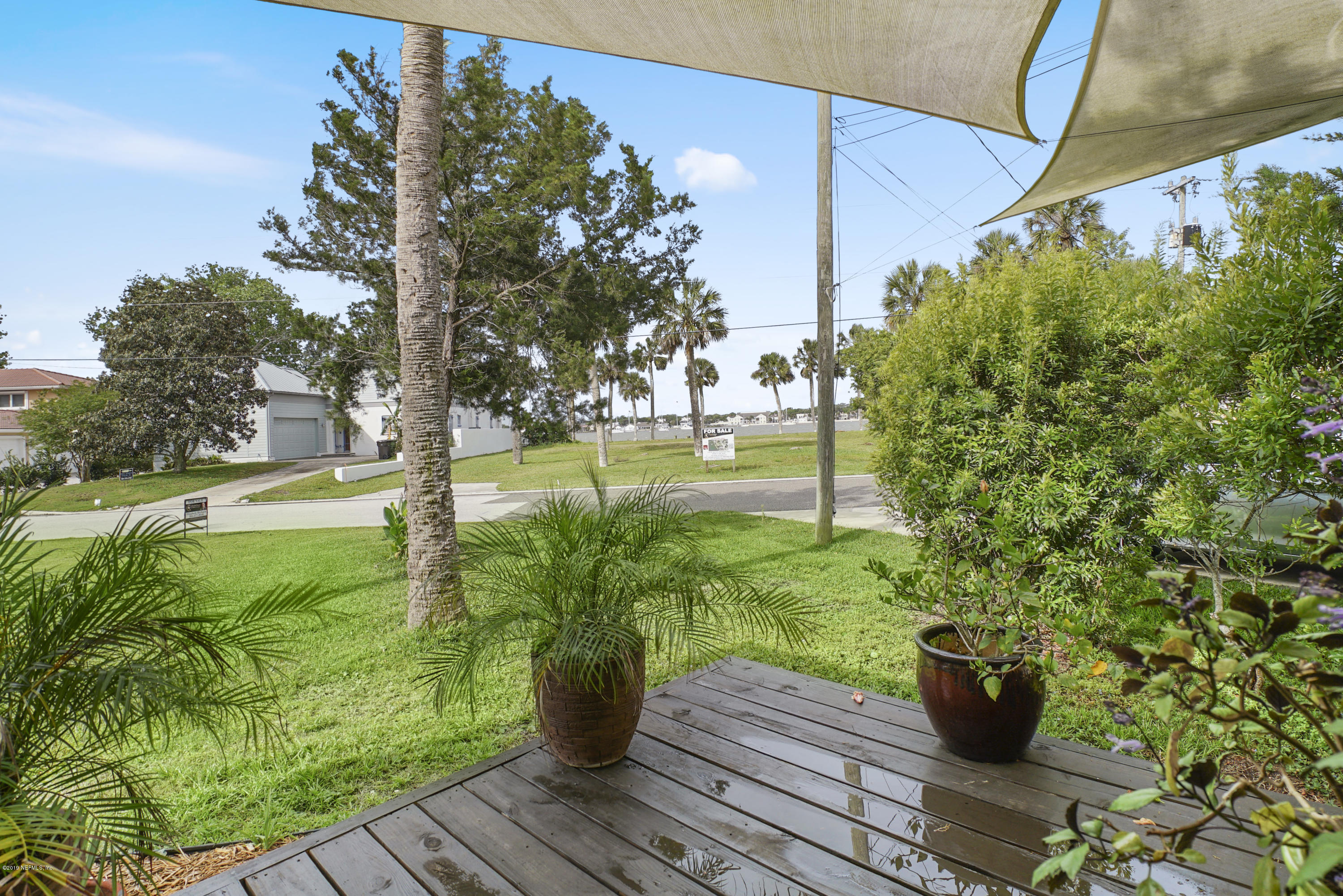32 Dolphin Drive St. Augustine, FL 32080 - Photo 36 of 43 a view of a backyard with sitting area