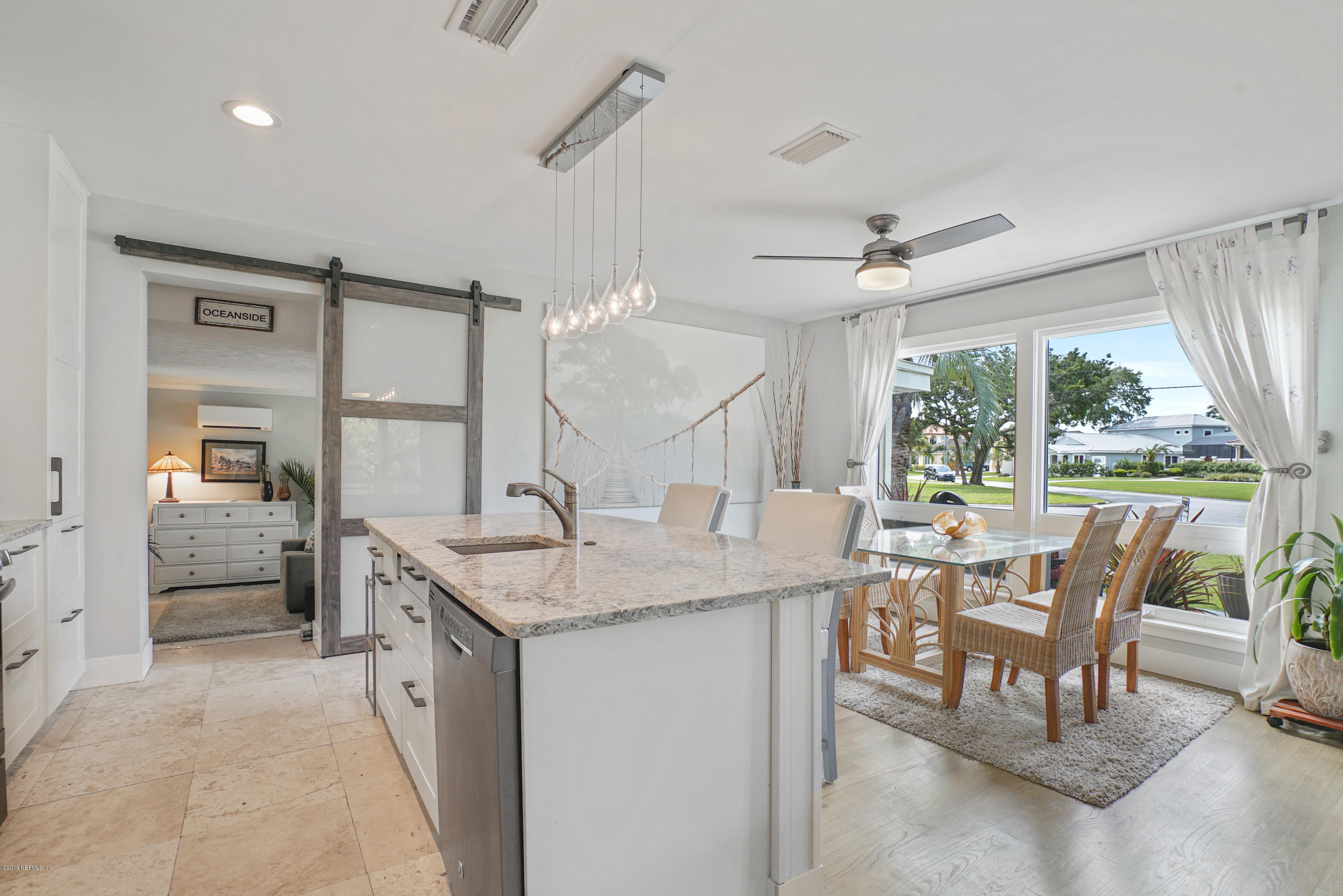 32 Dolphin Drive St. Augustine, FL 32080 - Photo 6 of 43 a view of a dining room with furniture window and outside view